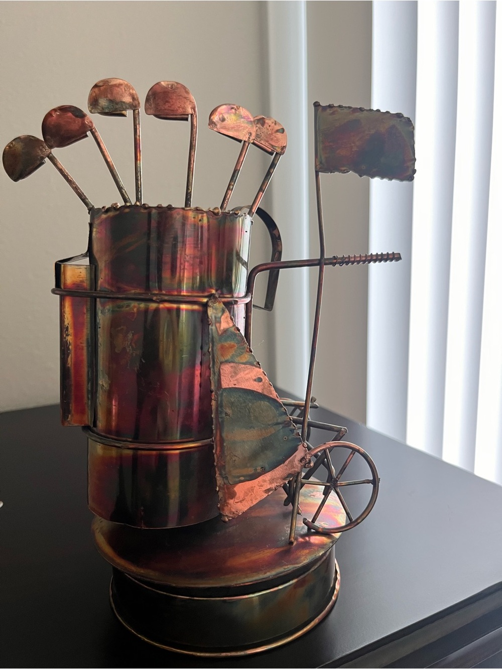 Vintage Berkeley Designs copper-toned golf bag and club sculpture and music box.